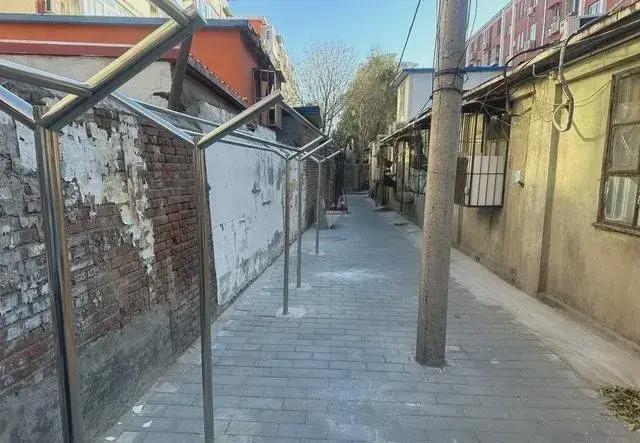 搭乱建居民想提升小区环境的愿望实现了凯发携手马竞赛事拆除700平方米私(图7)